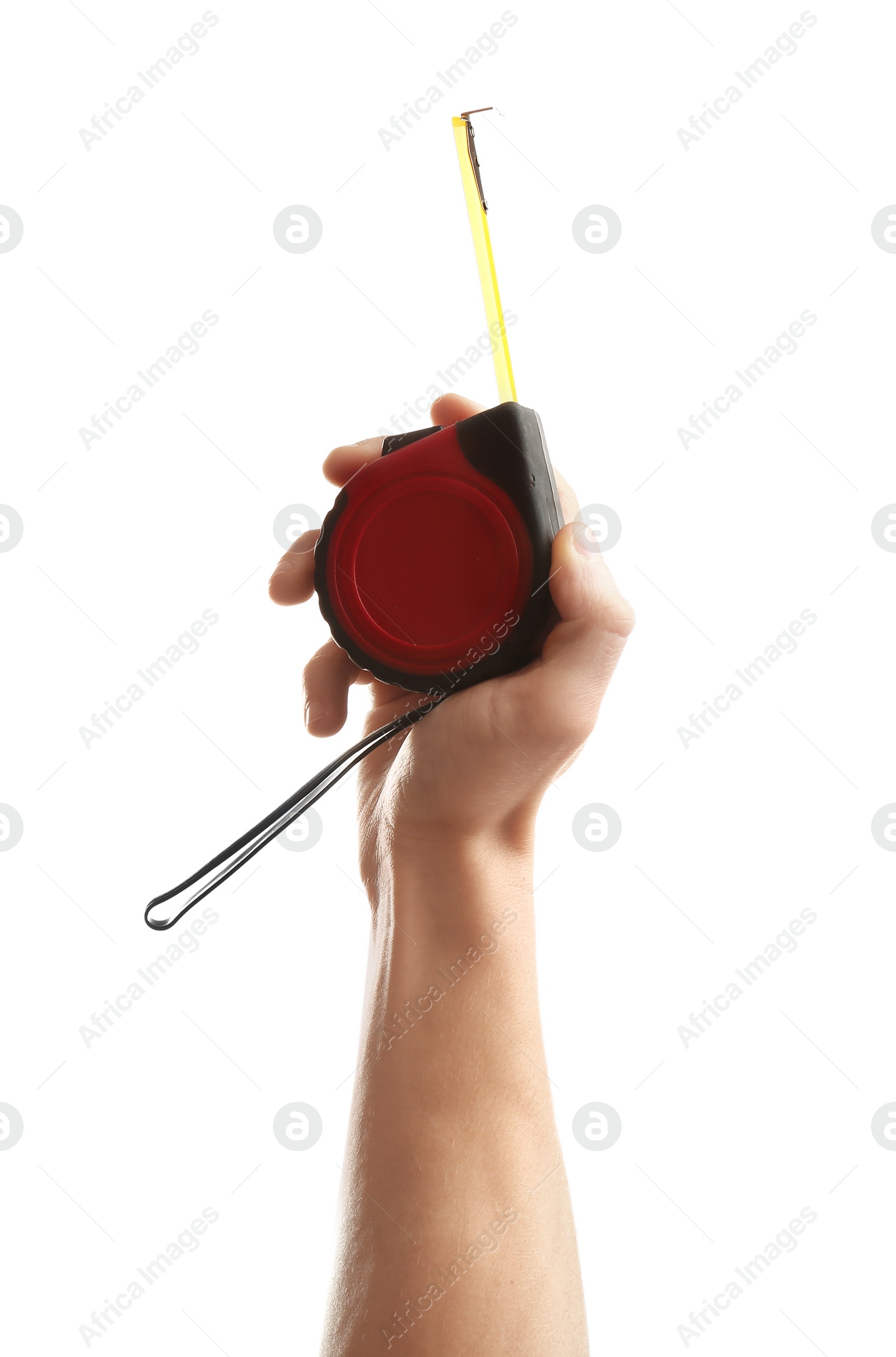 Photo of Man holding measuring tape on white background. Construction tools