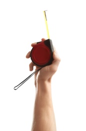 Man holding measuring tape on white background. Construction tools