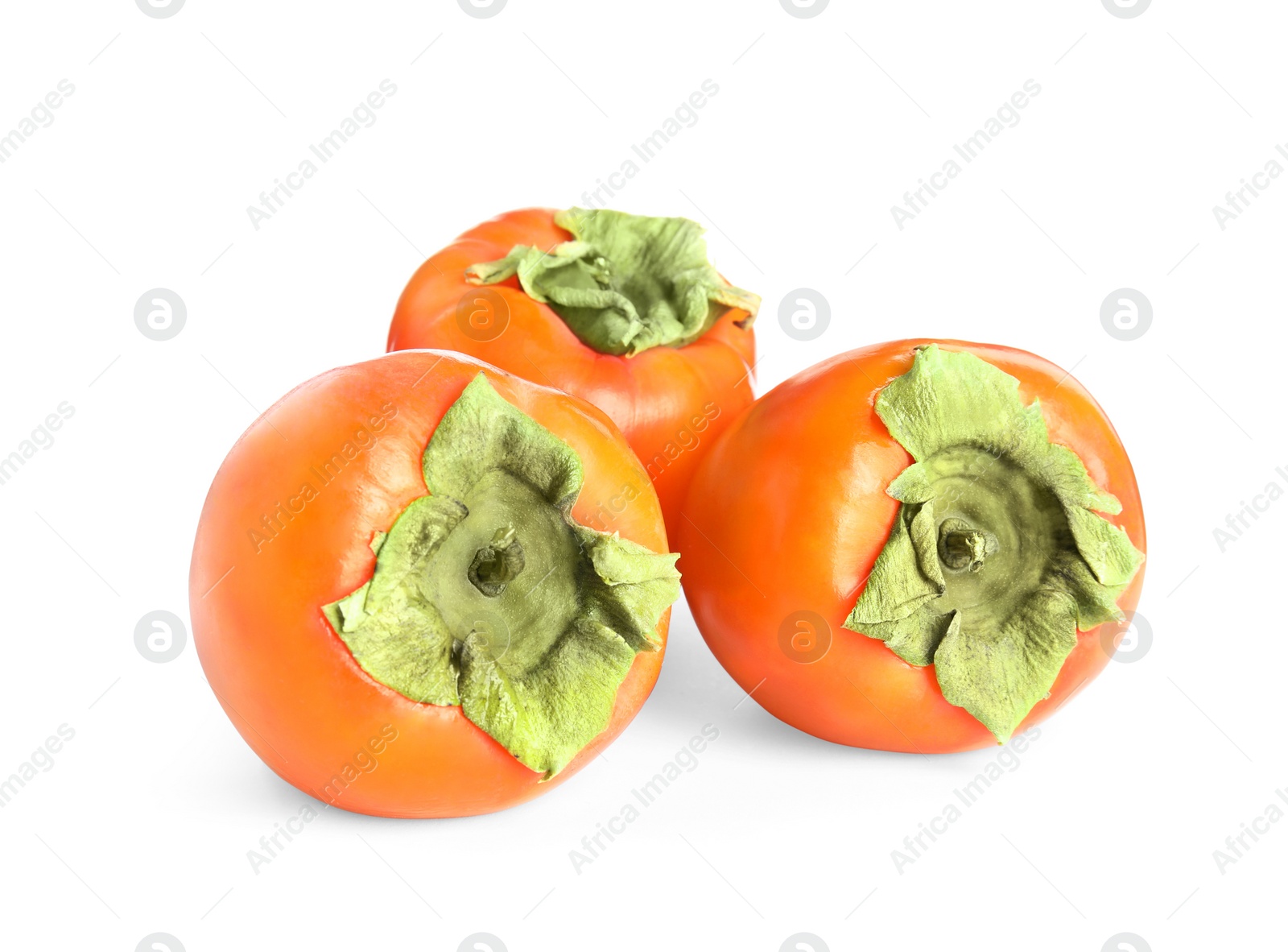 Photo of Delicious fresh ripe persimmons isolated on white