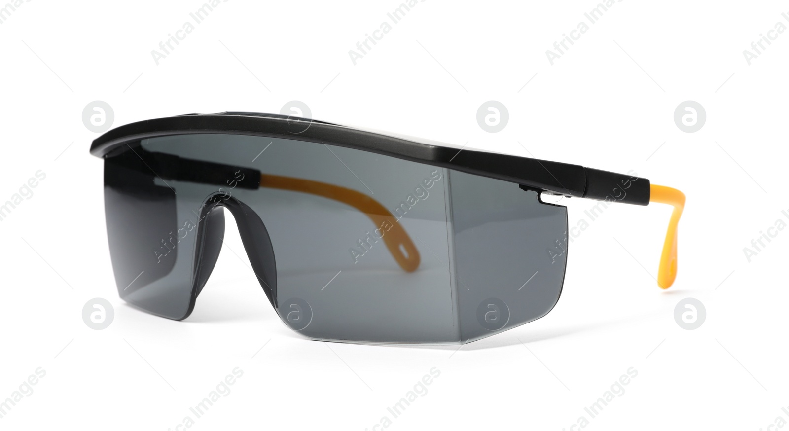 Photo of Protective goggles on white background. Construction tool