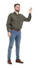Photo of Man in shirt and jeans waving hand on white background