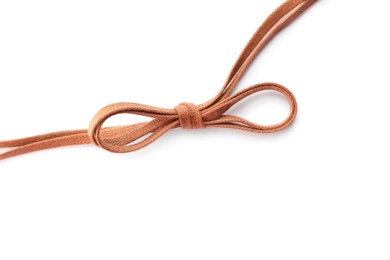 Photo of Brown shoe laces tied in bow isolated on white, top view