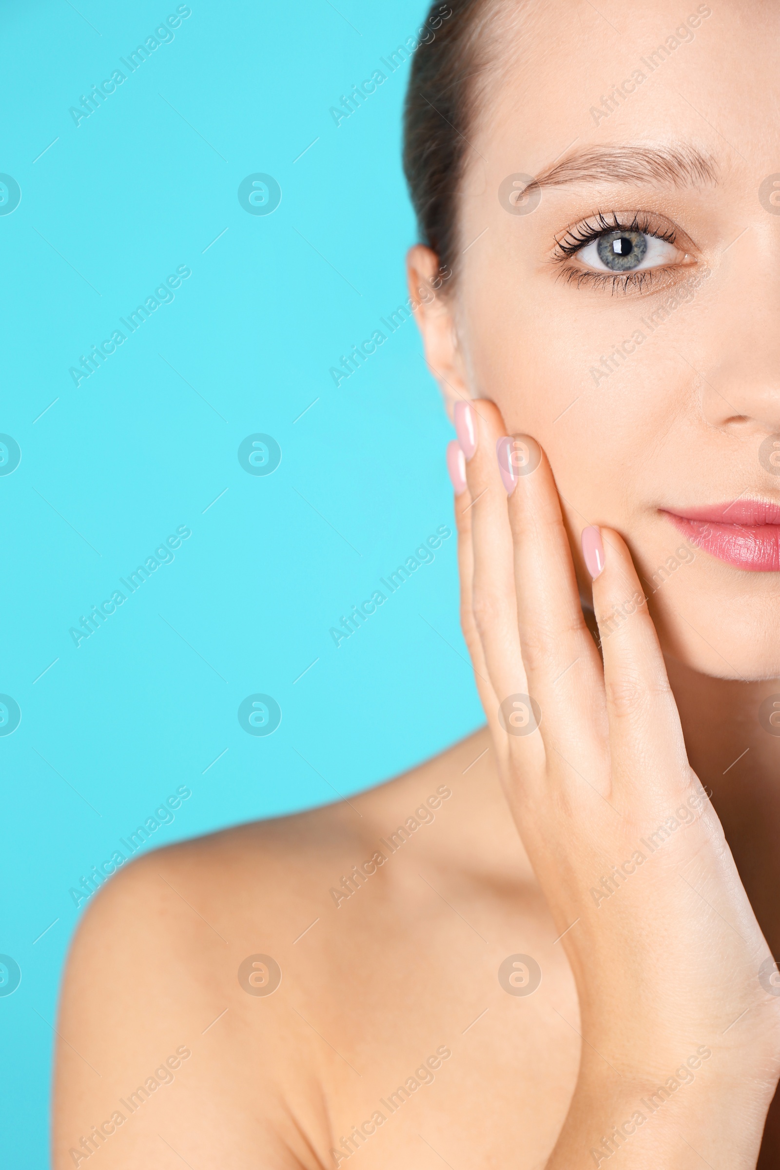 Photo of Portrait of beautiful young woman and space for text on color background. Cosmetic surgery concept