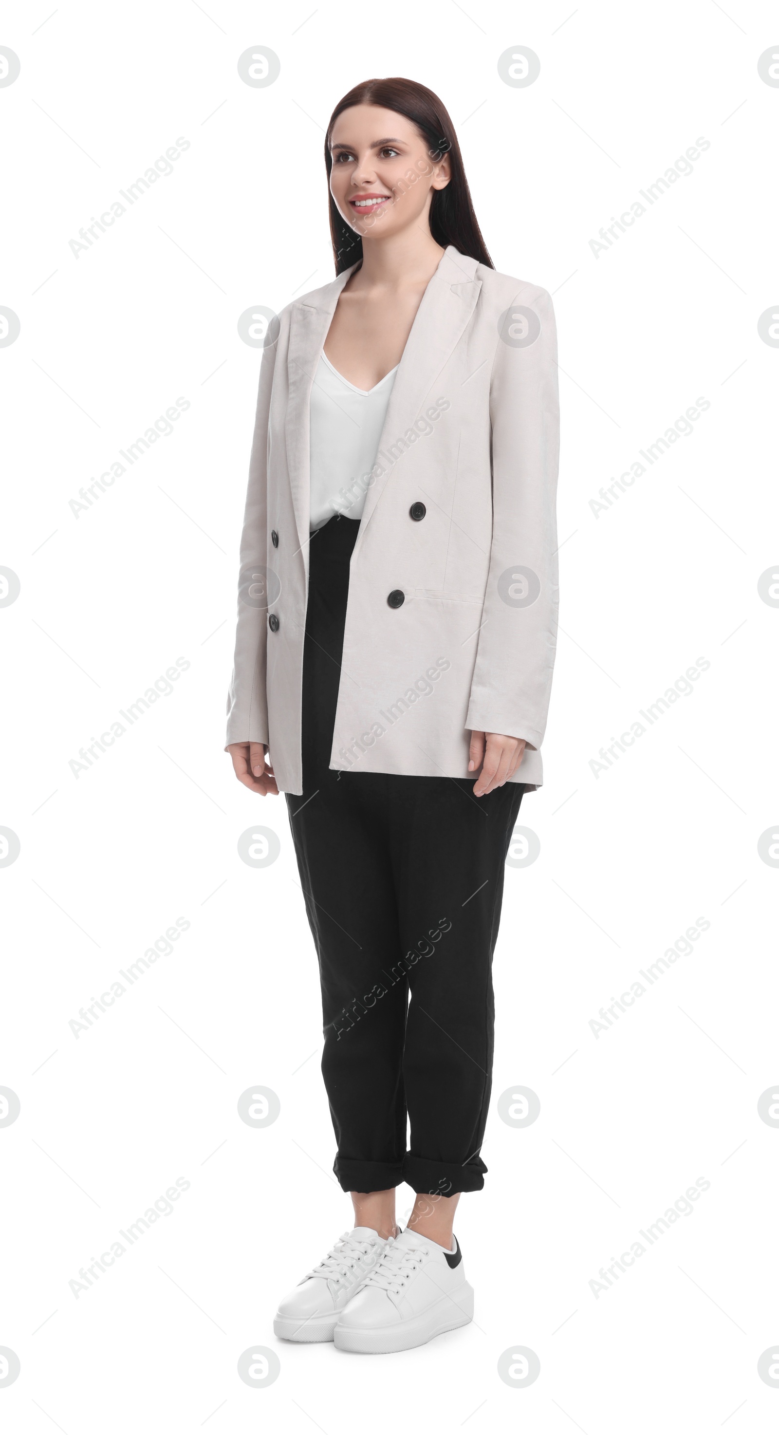 Photo of Beautiful young businesswoman in suit on white background