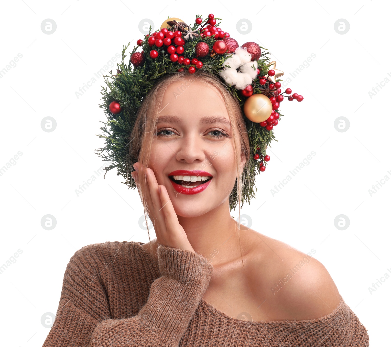 Photo of Beautiful young woman wearing Christmas wreath on white background