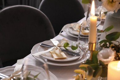 Photo of Festive table setting with beautiful decor indoors