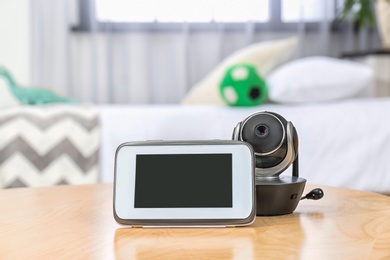 Baby monitors on table in room. CCTV equipment