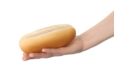 Woman with fresh hot dog bun on white background, closeup