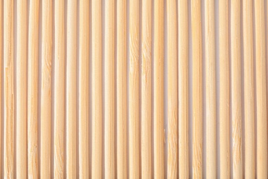 Texture of bamboo mat as background, closeup view