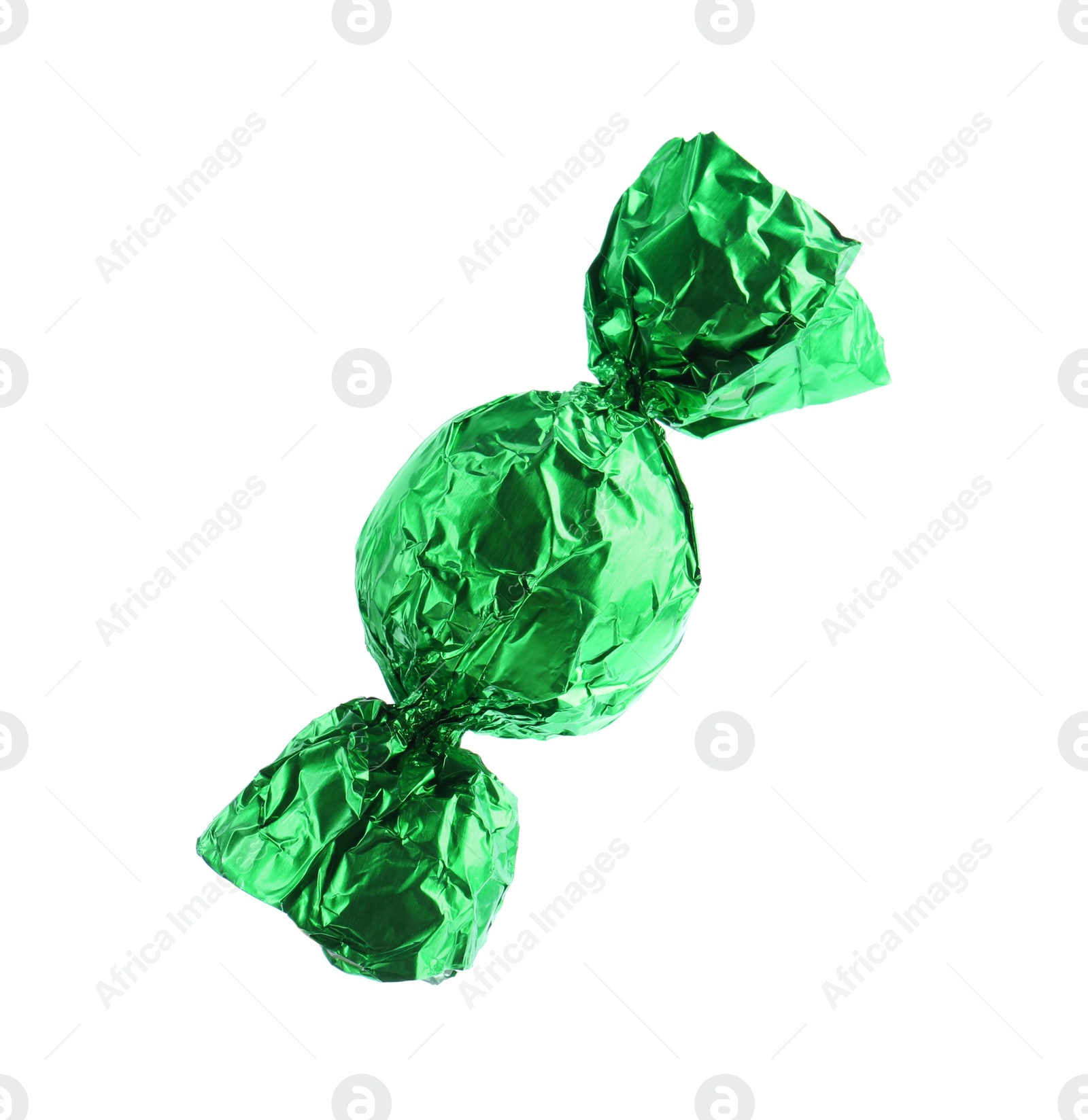 Photo of Tasty candy in green wrapper isolated on white