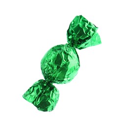 Photo of Tasty candy in green wrapper isolated on white