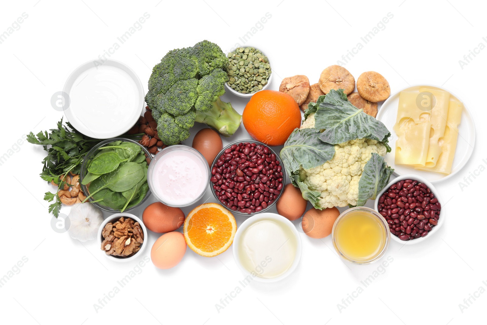 Photo of Set of natural food high in calcium on white background, top view