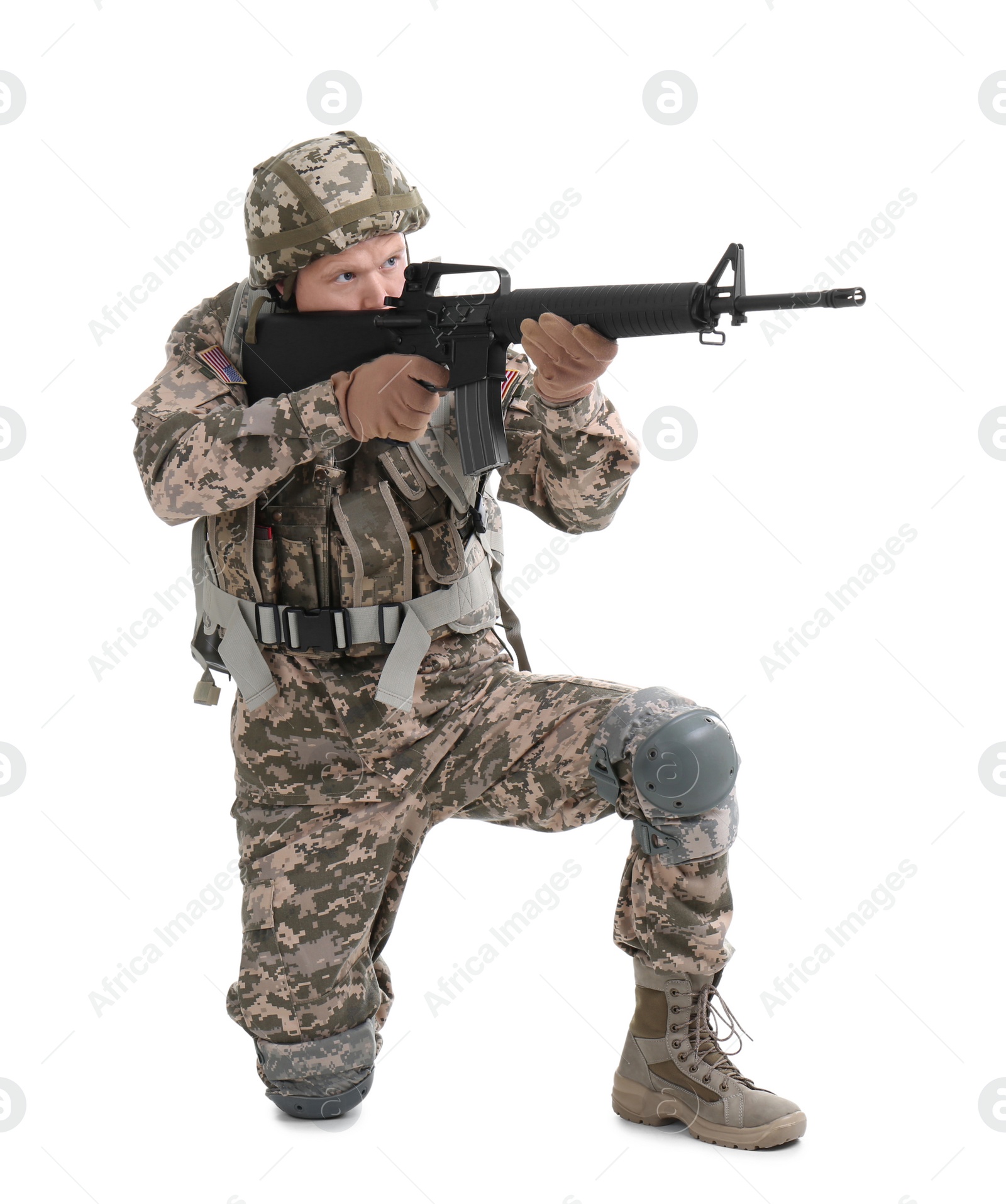 Photo of Male soldier with machine gun on white background. Military service