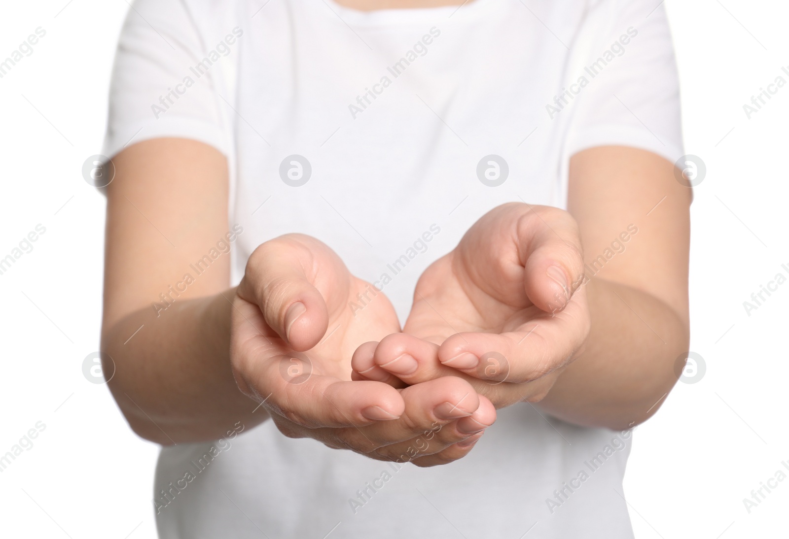 Photo of Woman against white background, closeup on hands