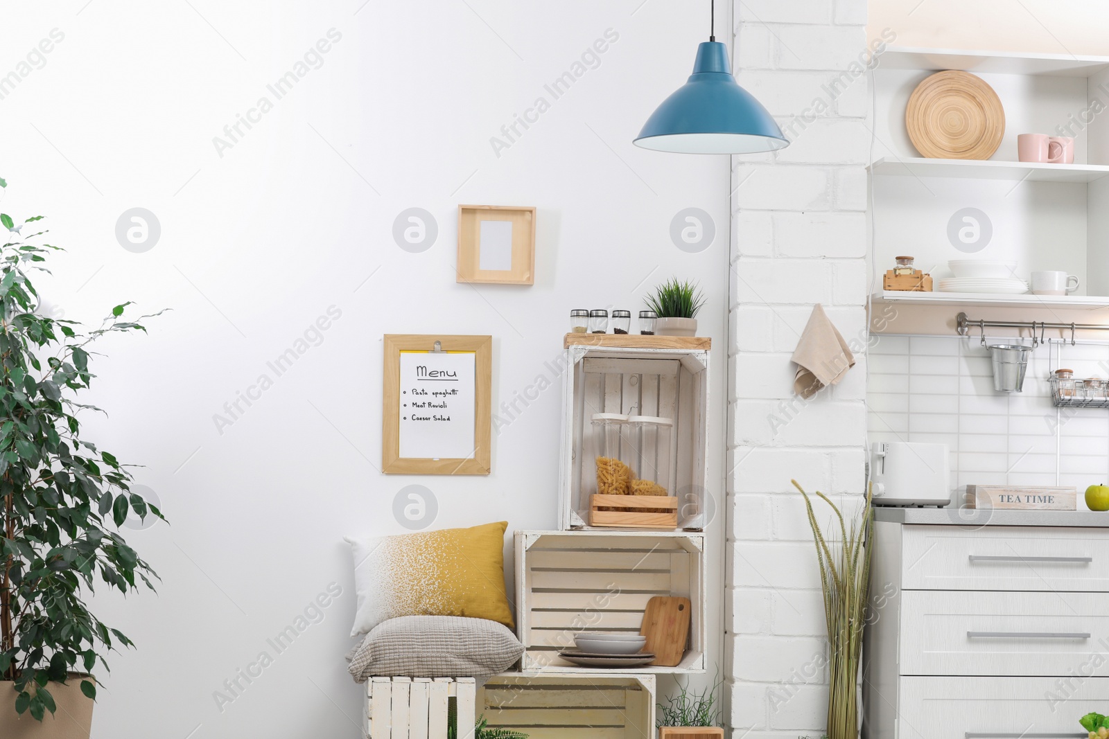 Photo of Modern kitchen interior with wooden crates as eco furniture