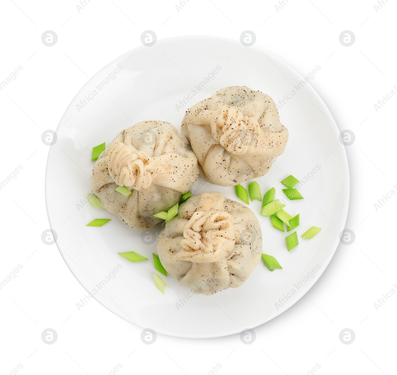 Photo of Plate with three tasty khinkali (dumplings) and onion isolated on white, top view. Georgian cuisine