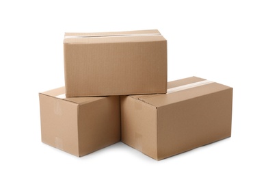 Photo of Cardboard boxes on white background. Mockup for design