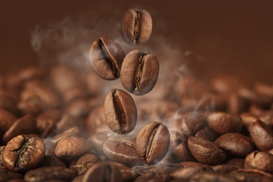 Image of Aromatic roasted coffee beans and steam, closeup