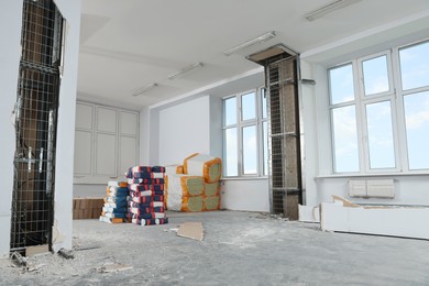 Photo of Building materials in room prepared for renovation