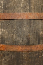 Photo of Traditional wooden barrel as background, closeup. Wine making