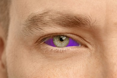 Image of Closeup view of man with eyeball tattoo