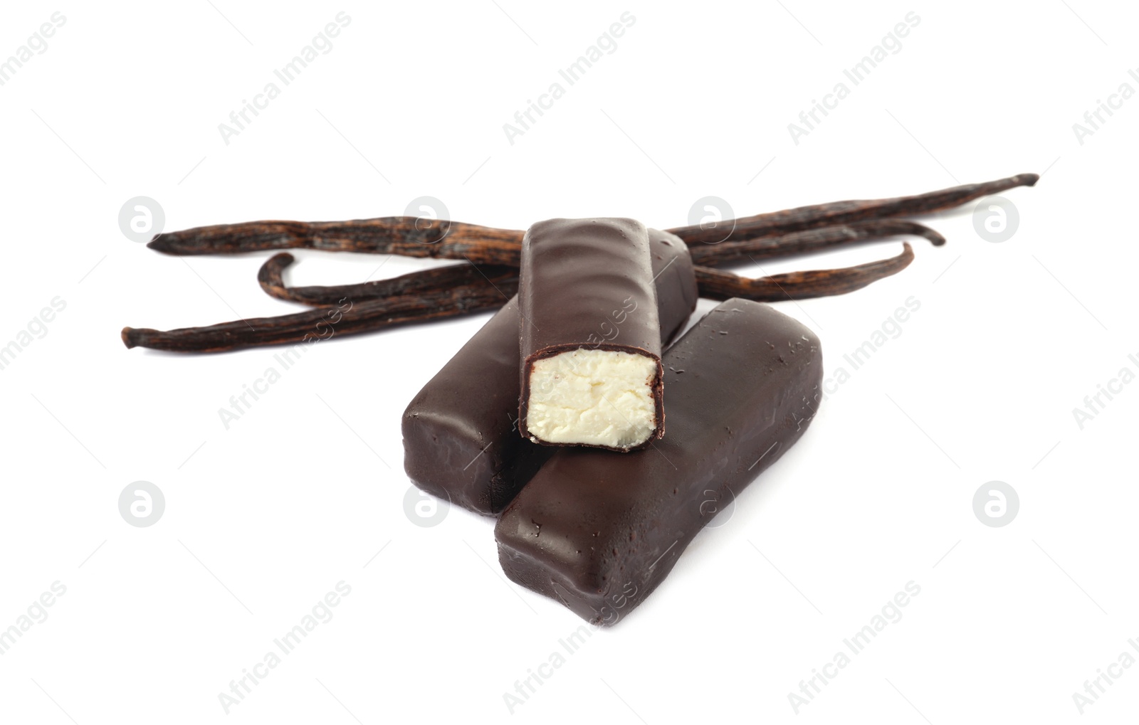 Photo of Glazed curd cheese bars and vanilla pods isolated on white