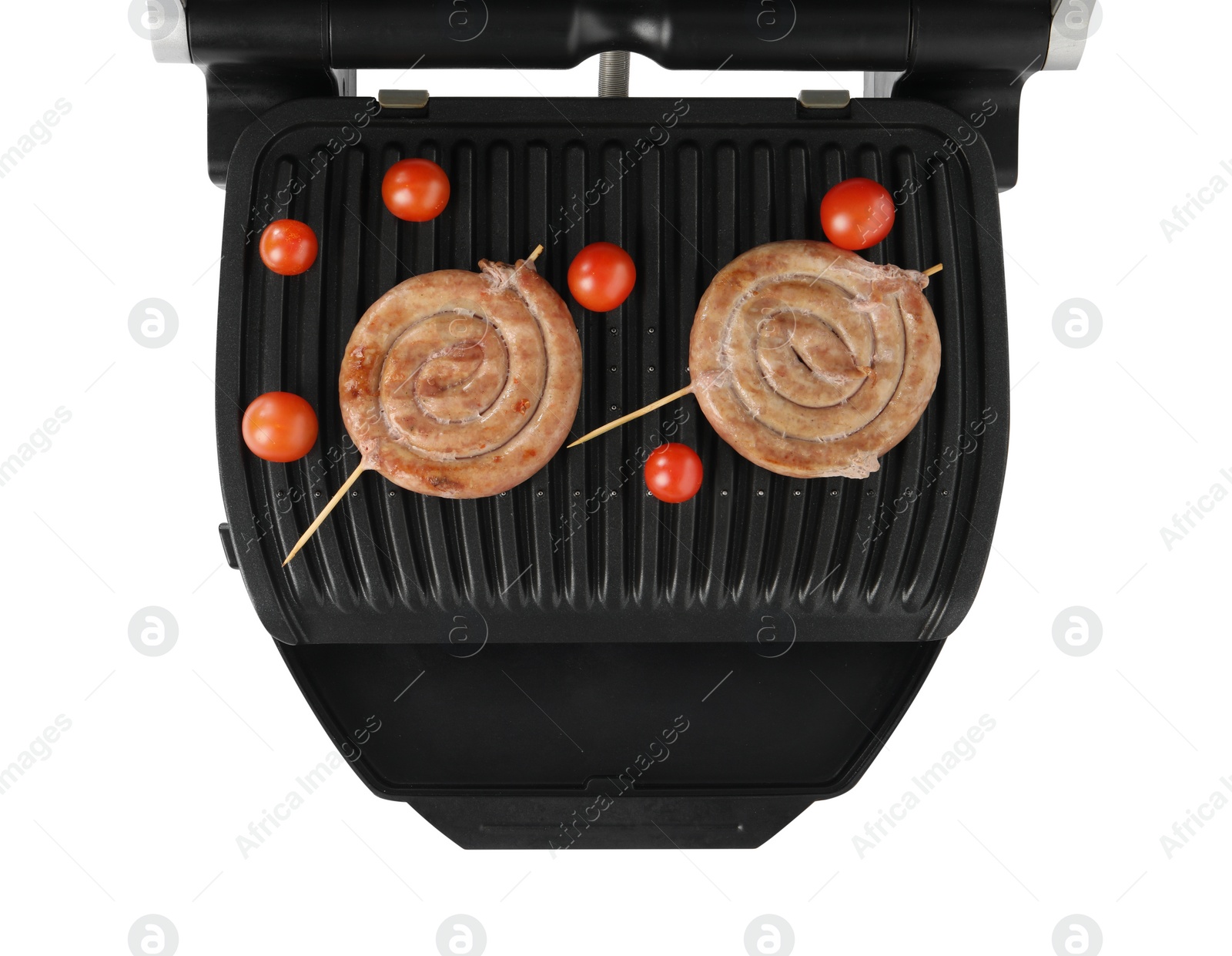 Photo of Electric grill with homemade sausages and fresh tomatoes isolated on white, top view