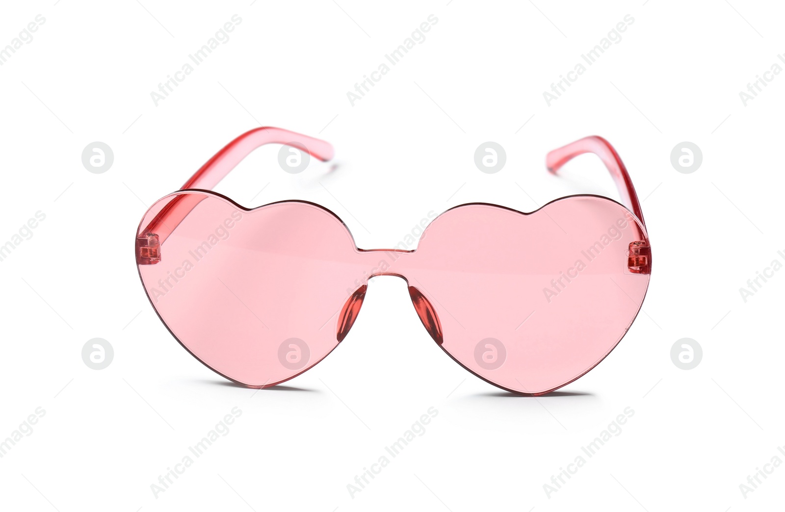 Photo of Stylish heart shaped glasses on white background