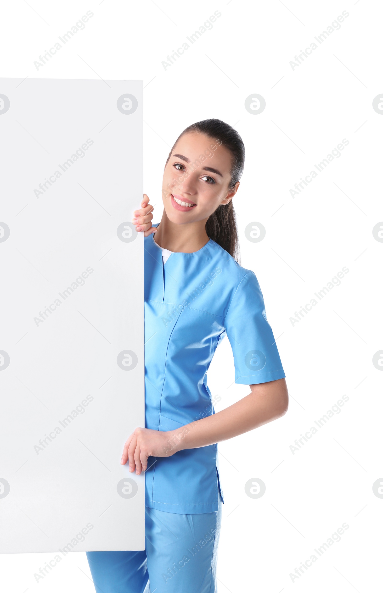 Photo of Medical student with blank poster on white background. Space for text
