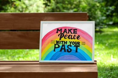 Photo of Phrase Make Peace With Your Past written on poster outdoors