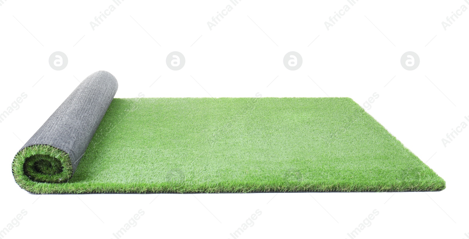 Photo of Rolled artificial grass carpet on white background. Exterior element