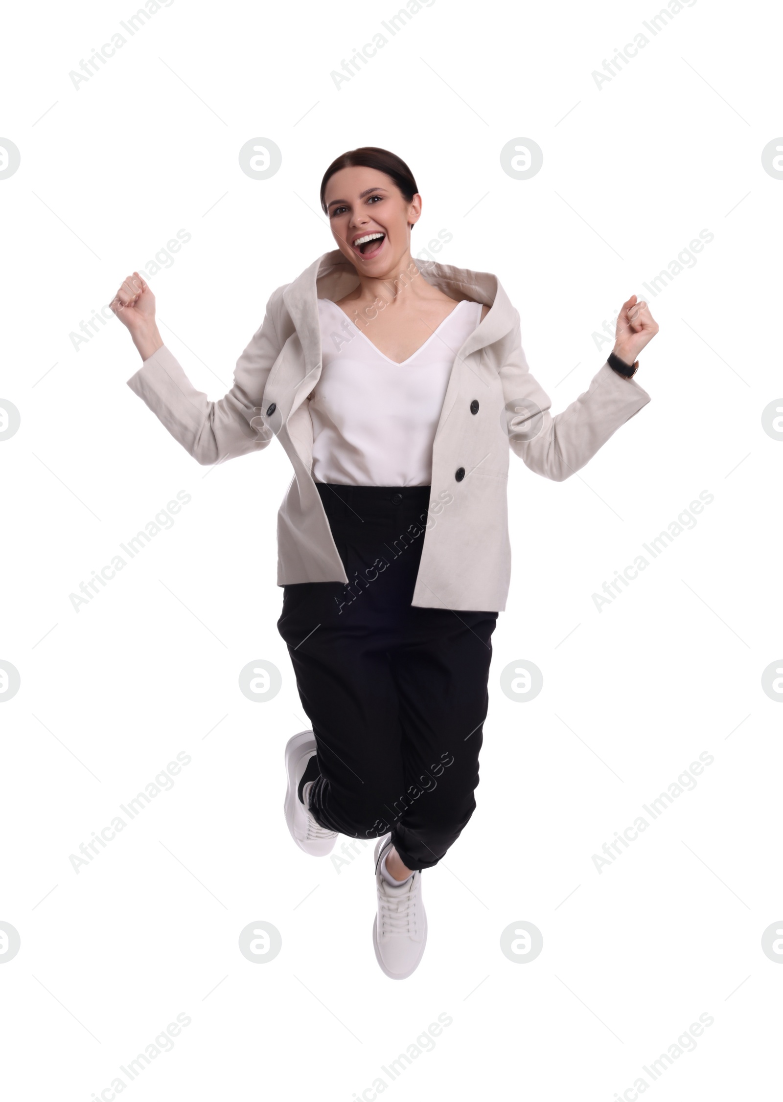 Photo of Beautiful businesswoman in suit jumping on white background