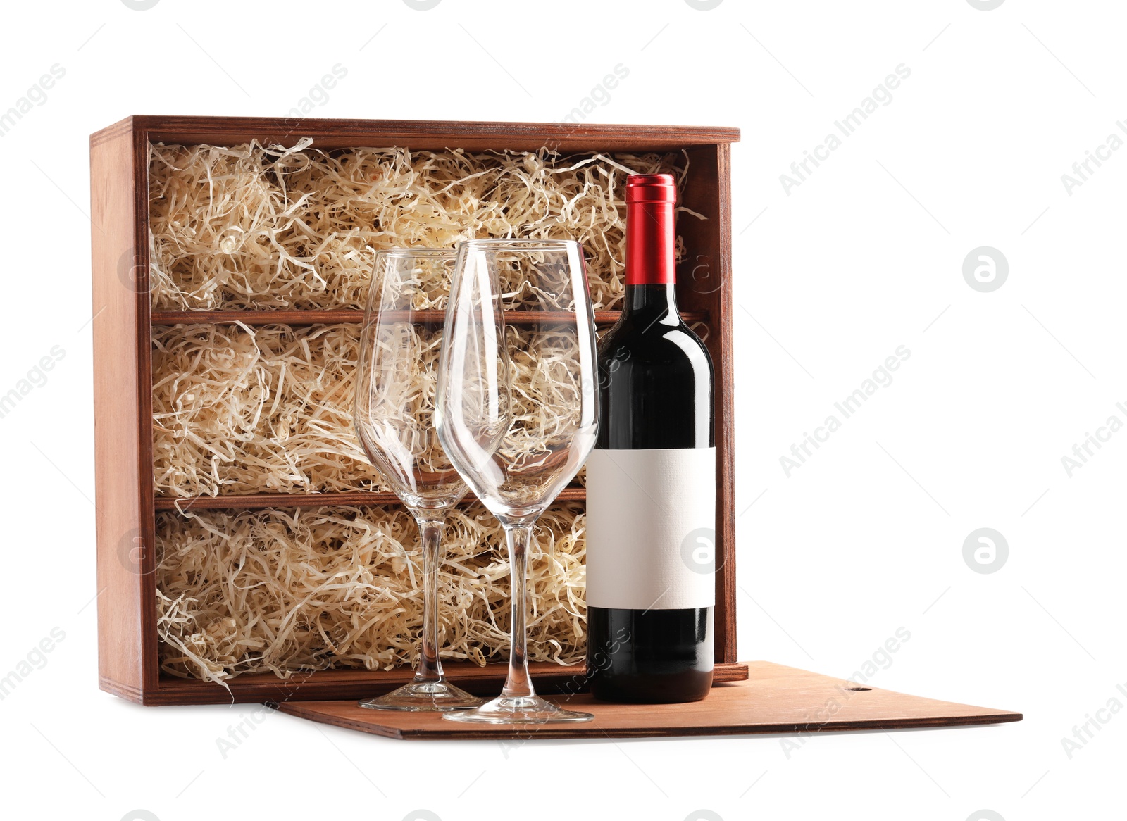 Photo of Wooden gift box, wine and glasses isolated on white