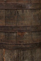 Photo of Traditional wooden barrel as background, closeup. Wine making