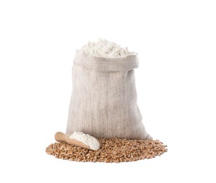 Photo of Sack with flour, scoop and grains on white background