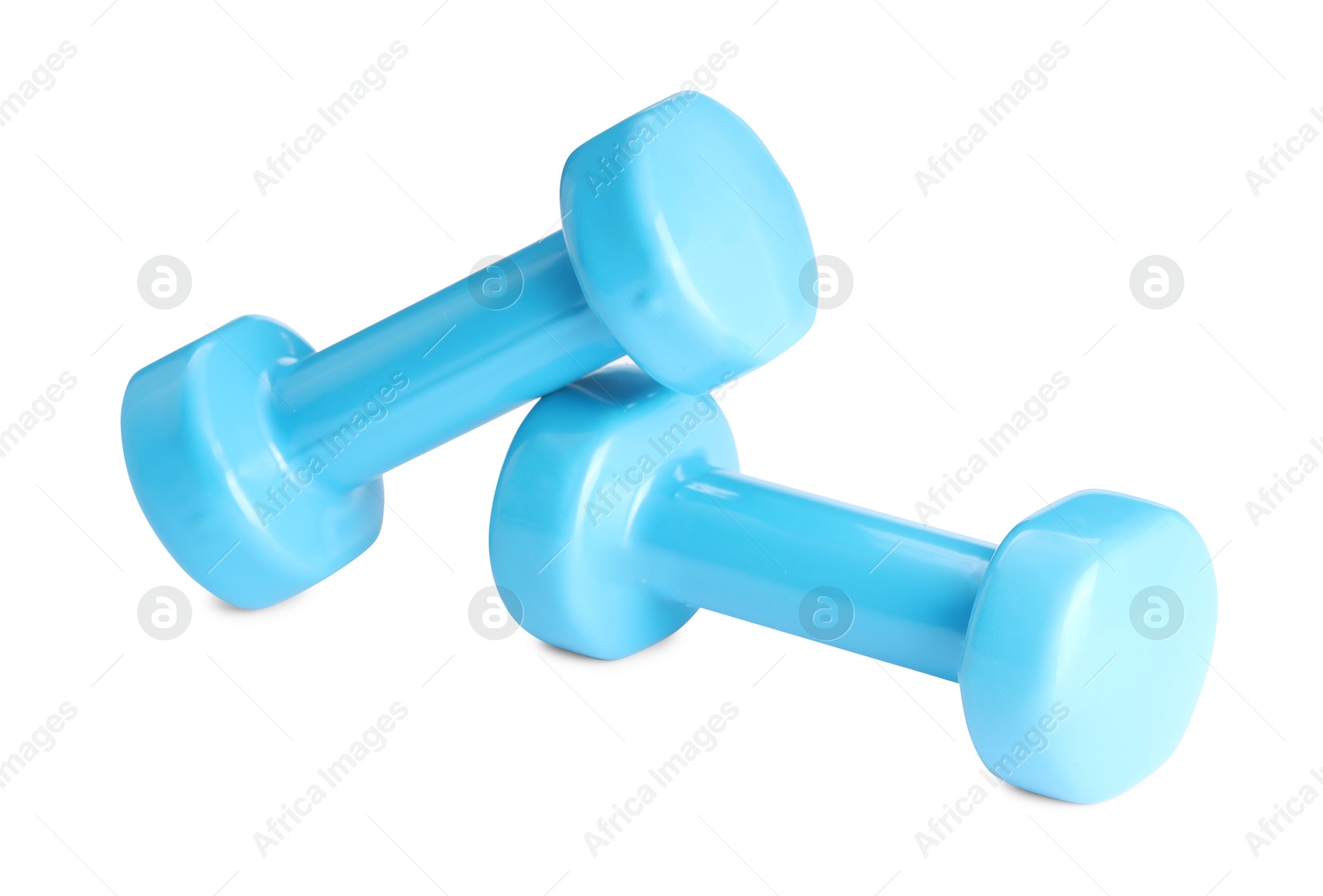 Photo of Light blue dumbbells isolated on white. Sports equipment