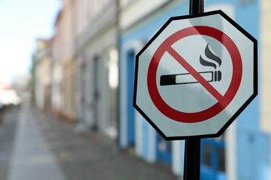 Sign No Smoking on city street. Space for text