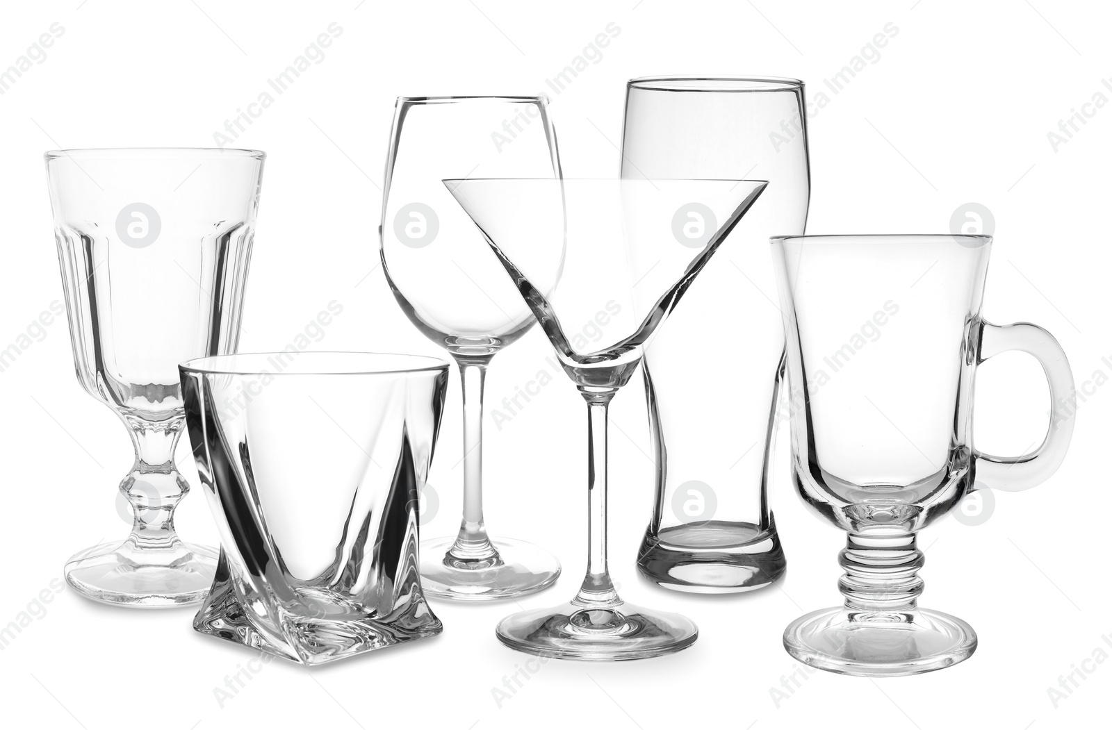 Image of Set of empty glasses on white background