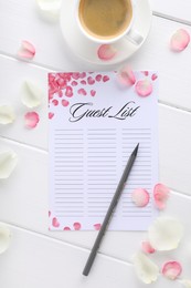 Guest list, pencil, coffee and petals on white wooden table, flat lay. Space for text