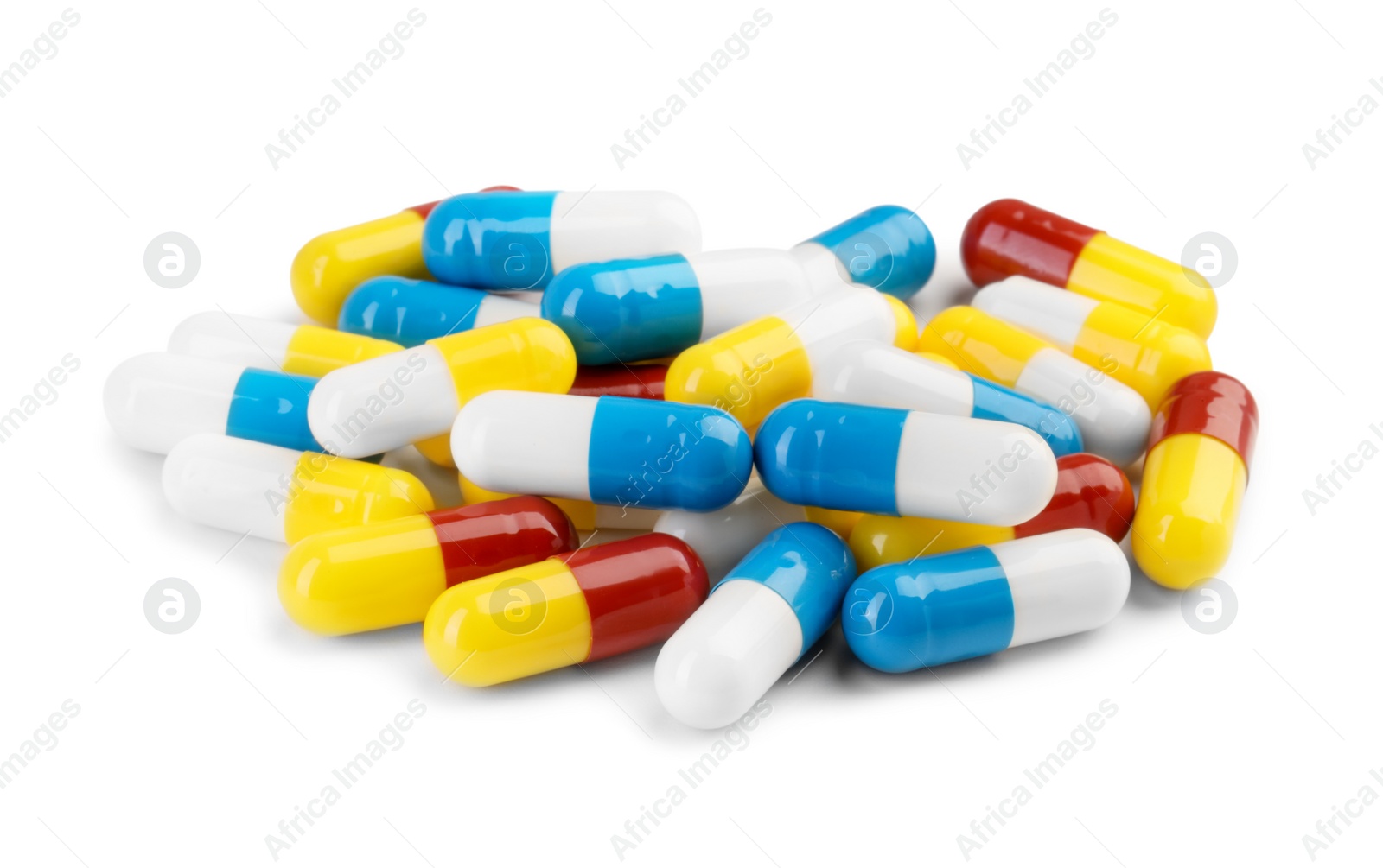 Photo of Many antibiotic pills isolated on white. Medicinal treatment