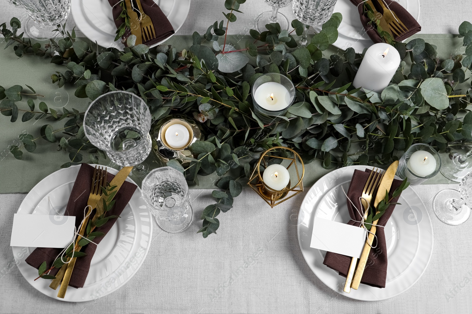 Photo of Luxury table setting with beautiful decor and blank cards. Festive dinner