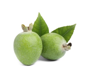 Photo of Fresh feijoa fruits with leaves on white background