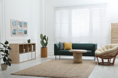 Photo of Comfortable sofa in modern living room. Interior design