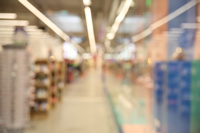 Blurred view of modern shopping mall interior