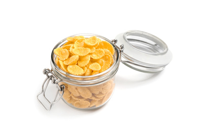 Glass jar with corn flakes isolated on white