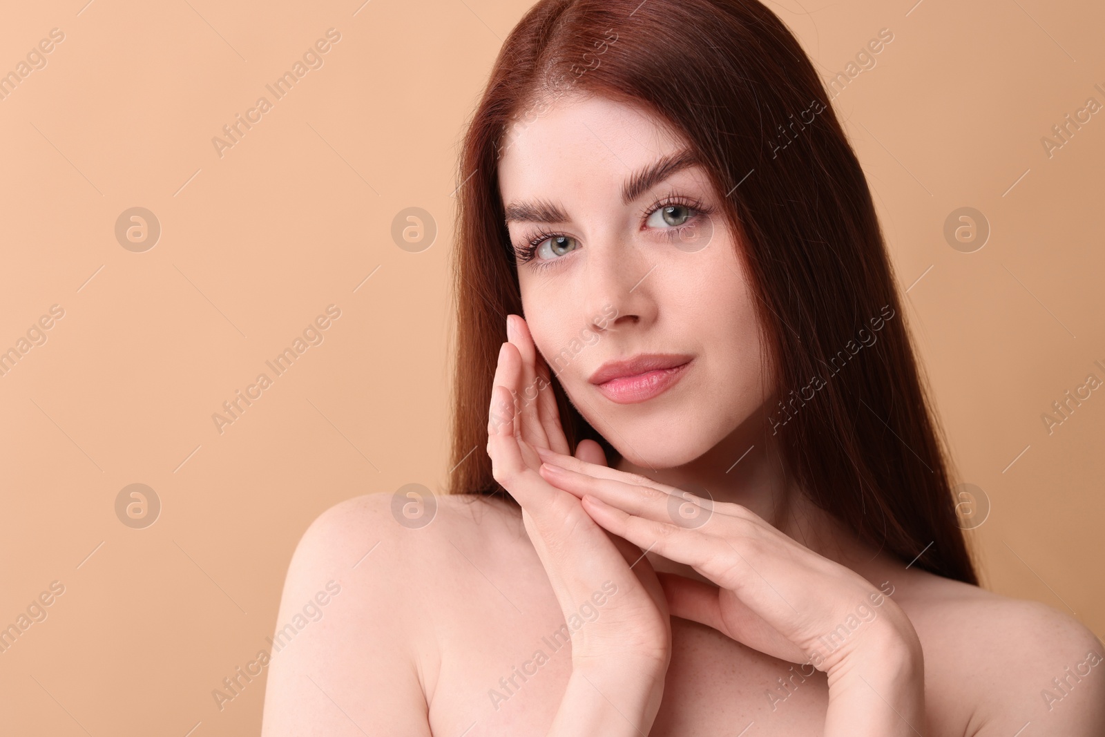 Photo of Portrait of beautiful woman on beige background. Space for text