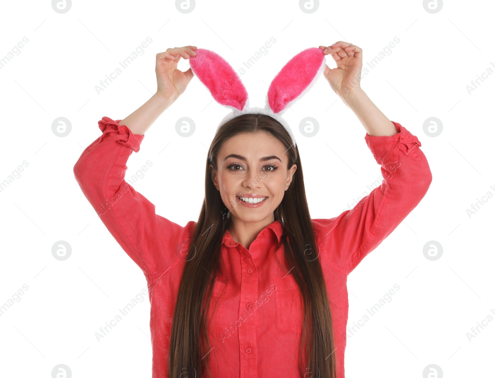 Photo of Portrait of beautiful woman in Easter bunny ears headband on white background