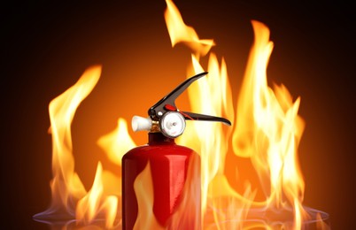Fire extinguisher surrounded by flame on dark background