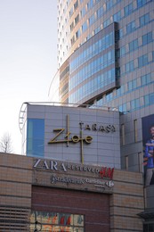 Photo of WARSAW, POLAND - MARCH 22, 2022: Shopping mall Golden Terraces on city street