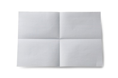 Photo of Checkered sheet of paper with creases on white background, top view